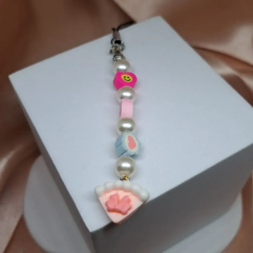 [TiniAcc-200] Pendiente para Celular Perla Caramelo